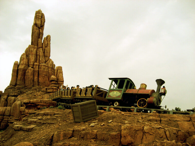 Big Thunder Mountain Railroad train on a rocky track.