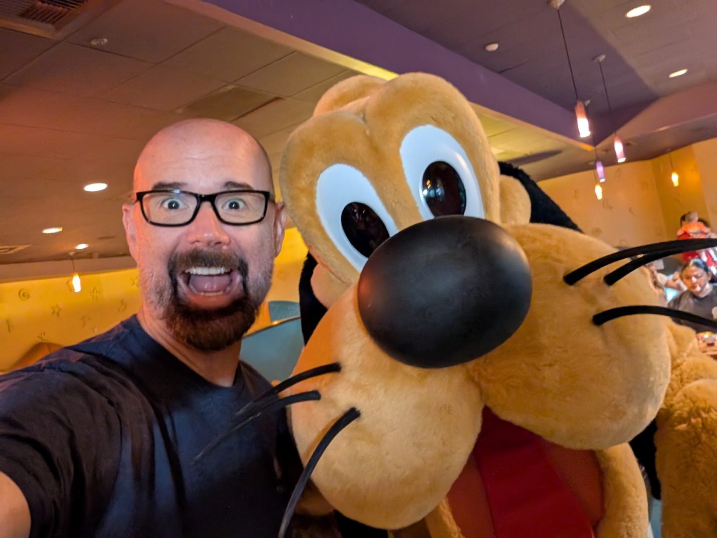 Selfie with Pluto at Goofy’s Kitchen.