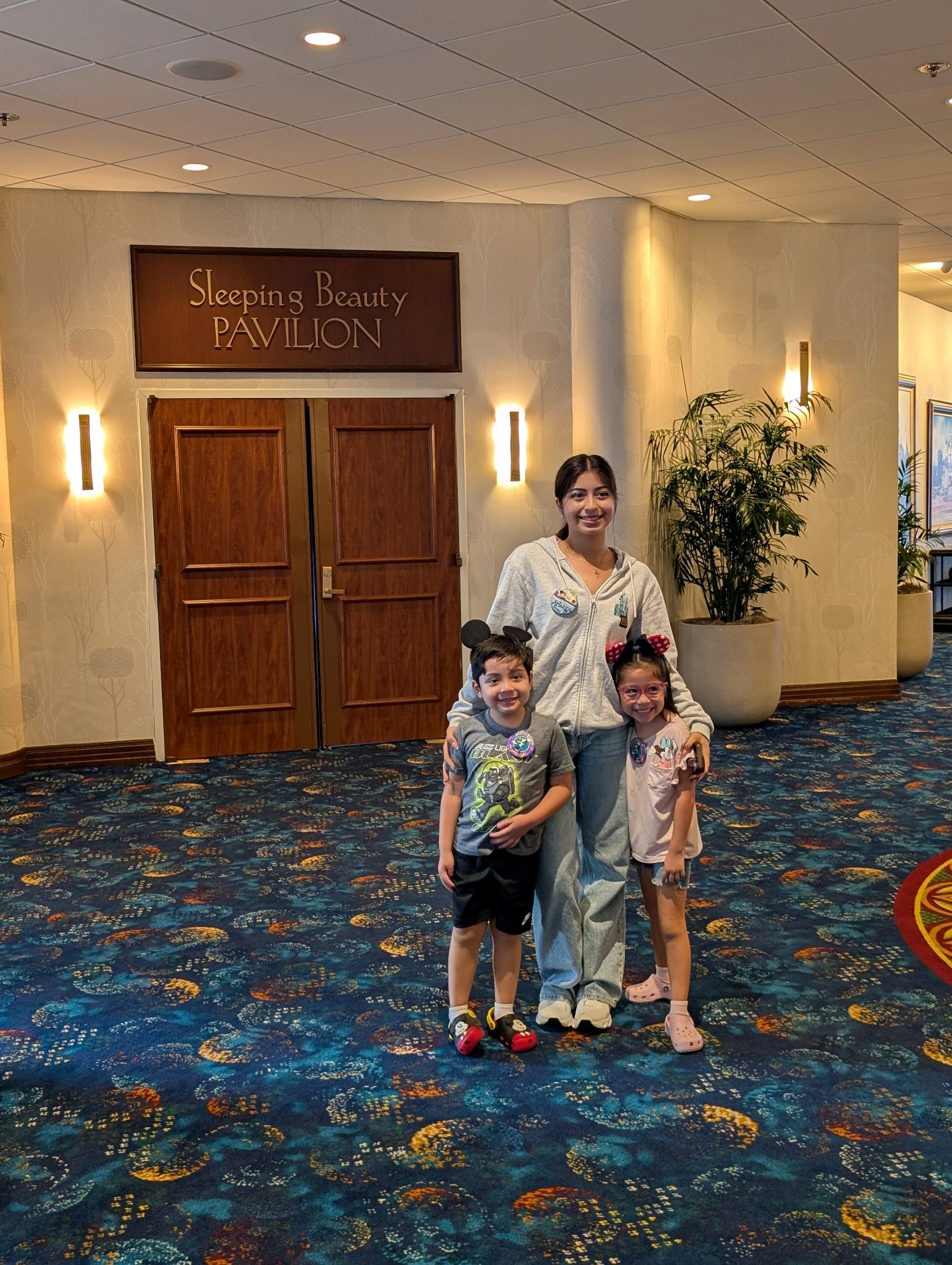 Child standing in a Disneyland Hotel hallway.