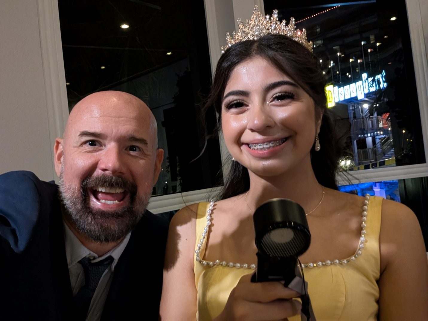 Father and daughter selfie during the party.