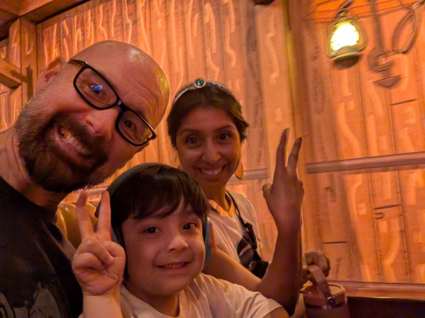 Selfie with a child inside Mickey and Minnie’s Runaway Railway.