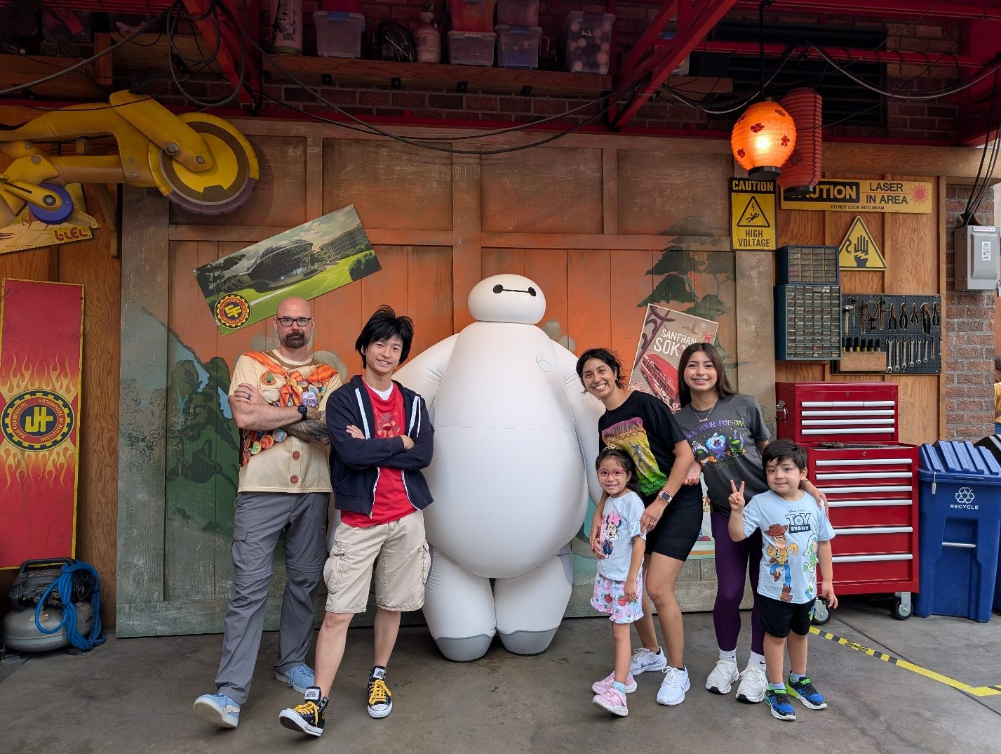 Family photo with Baymax and Hiro.