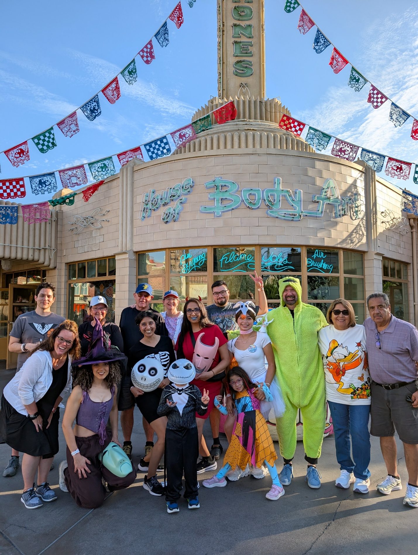 Group in costume posing for Oogie Boogie Bash.