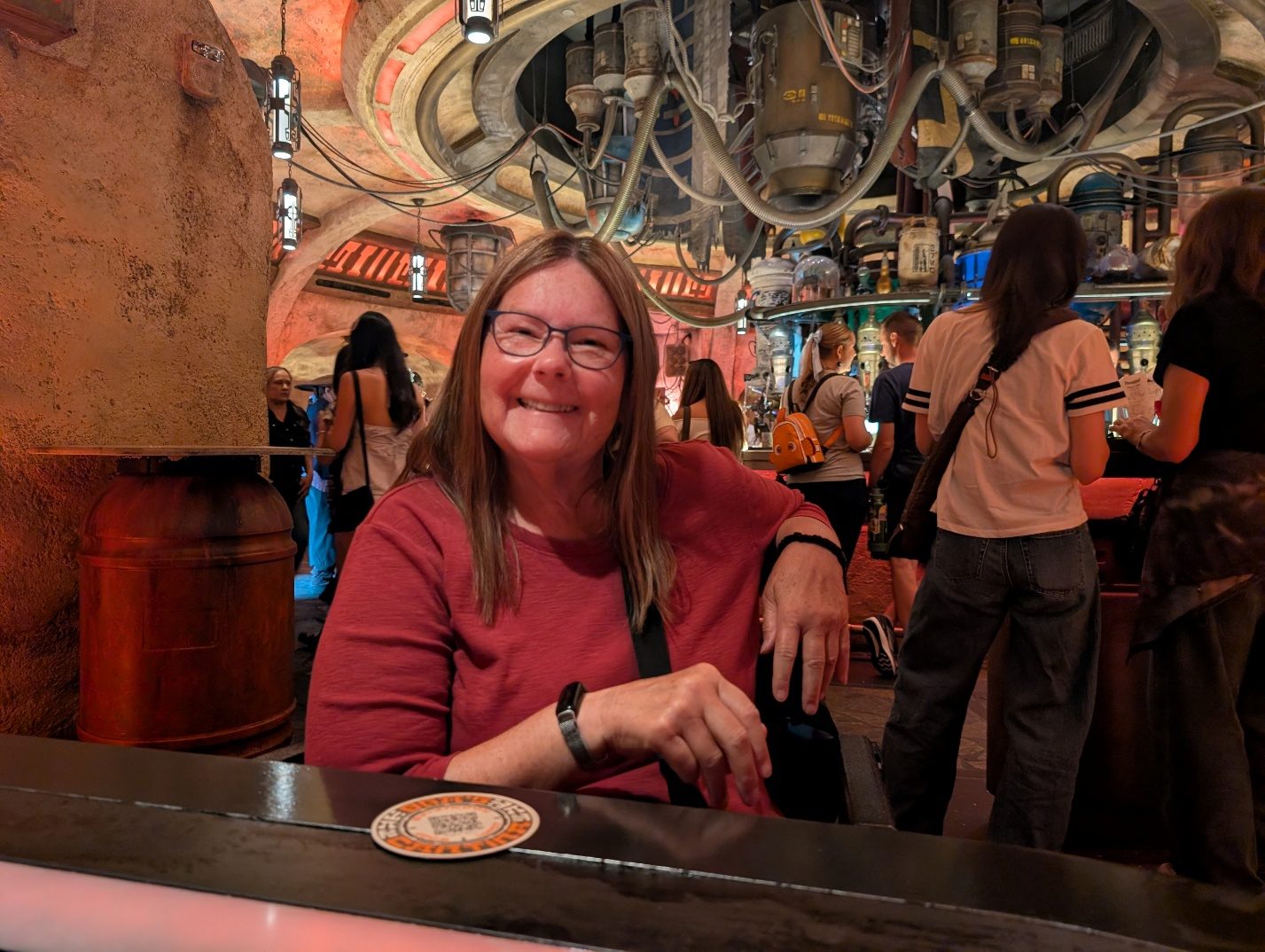 Guest seated inside Oga’s Cantina.