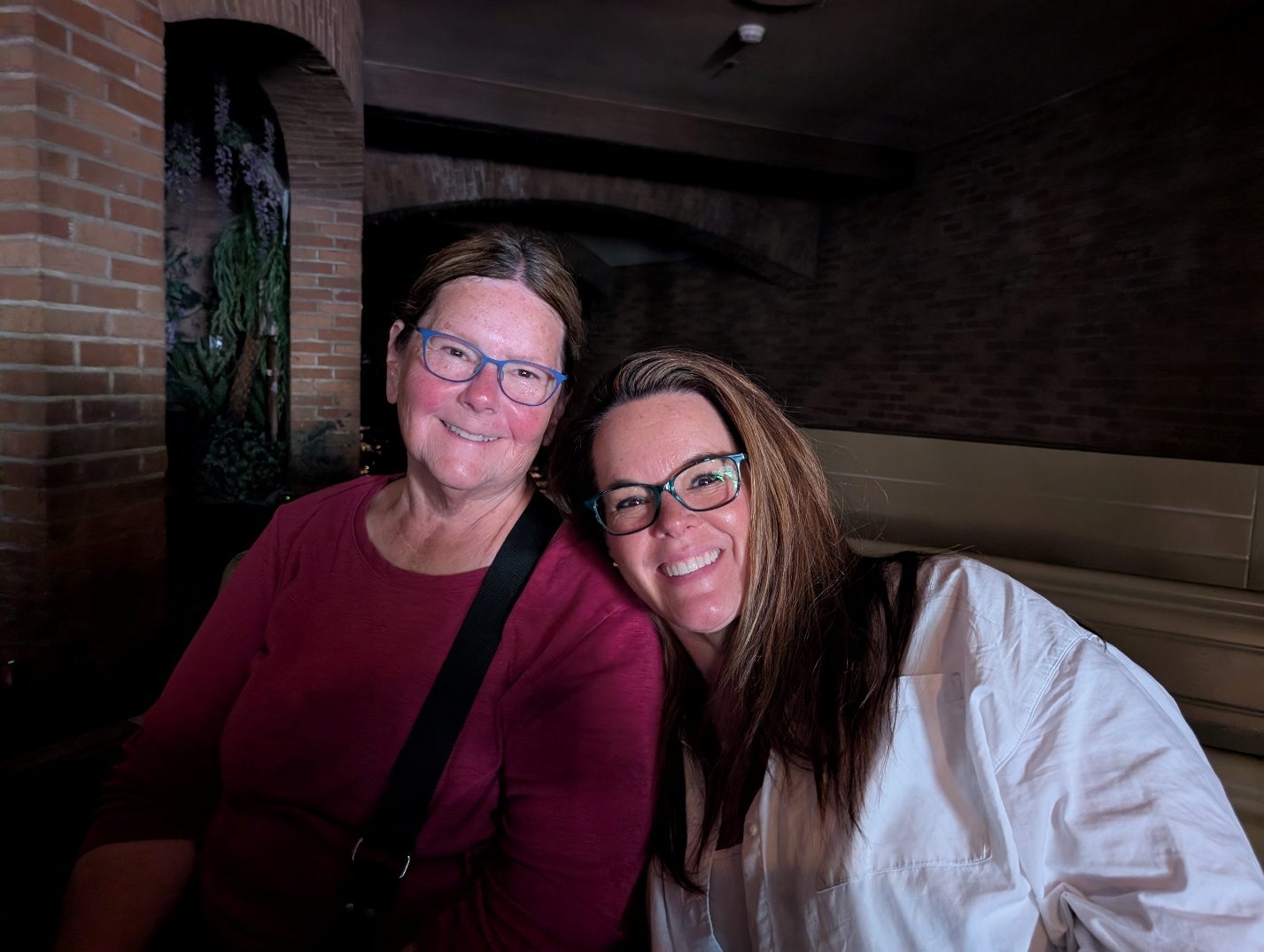 Two guests seated on Pirates of the Caribbean.