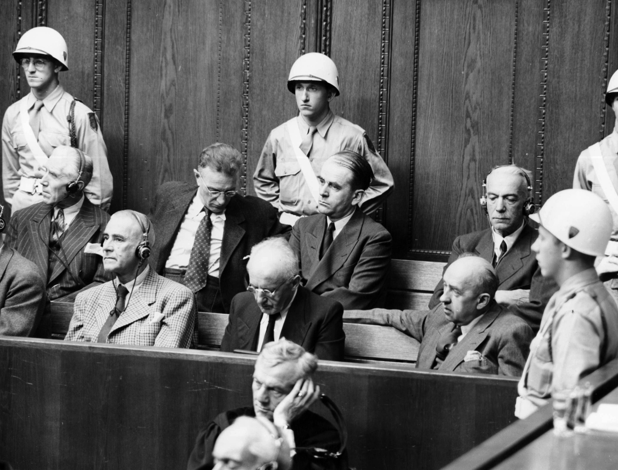 Black and white courtroom image of Nuremberg defendants including Julius Streicher.