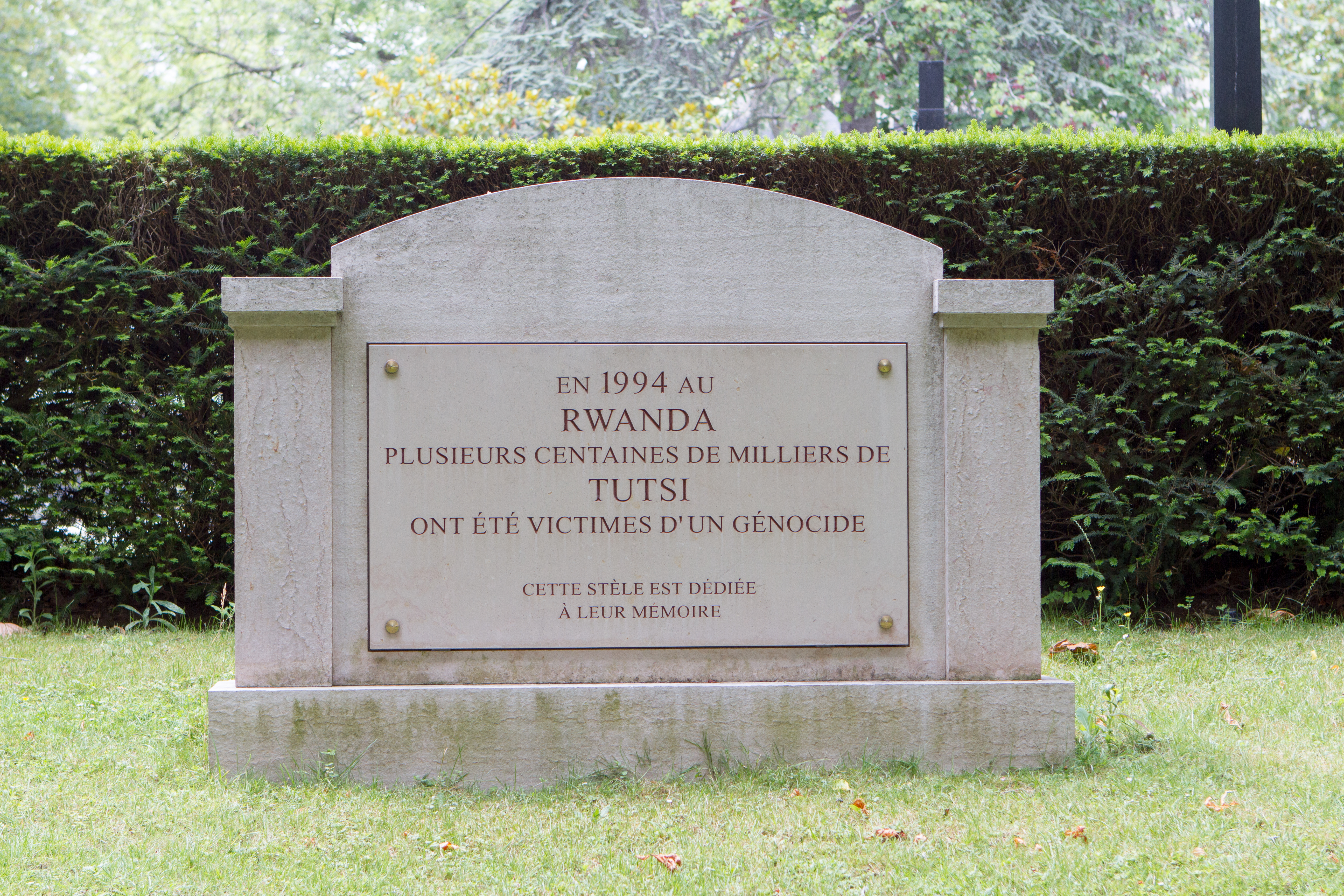A memorial stone dedicated to Tutsi victims of the 1994 Rwandan genocide.