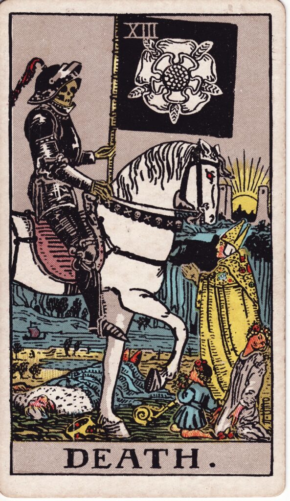 The Death tarot card showing an armored skeleton riding a white horse.